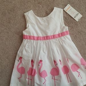White dress with flamingos